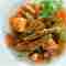 Fresh green beans with red sauce and feta cheese