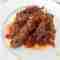 Goat in red sauce